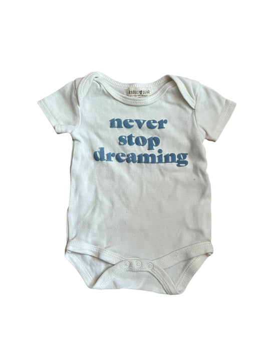 White “never stop dreaming” onesie, 0-3 months