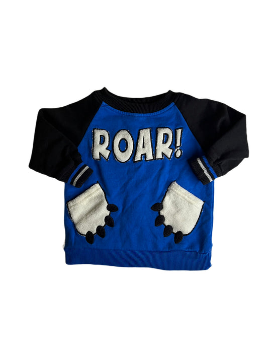 Blue “roar” shirt with pockets, 12 months