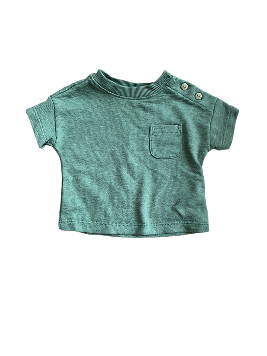 Green shirt, 0-3 months